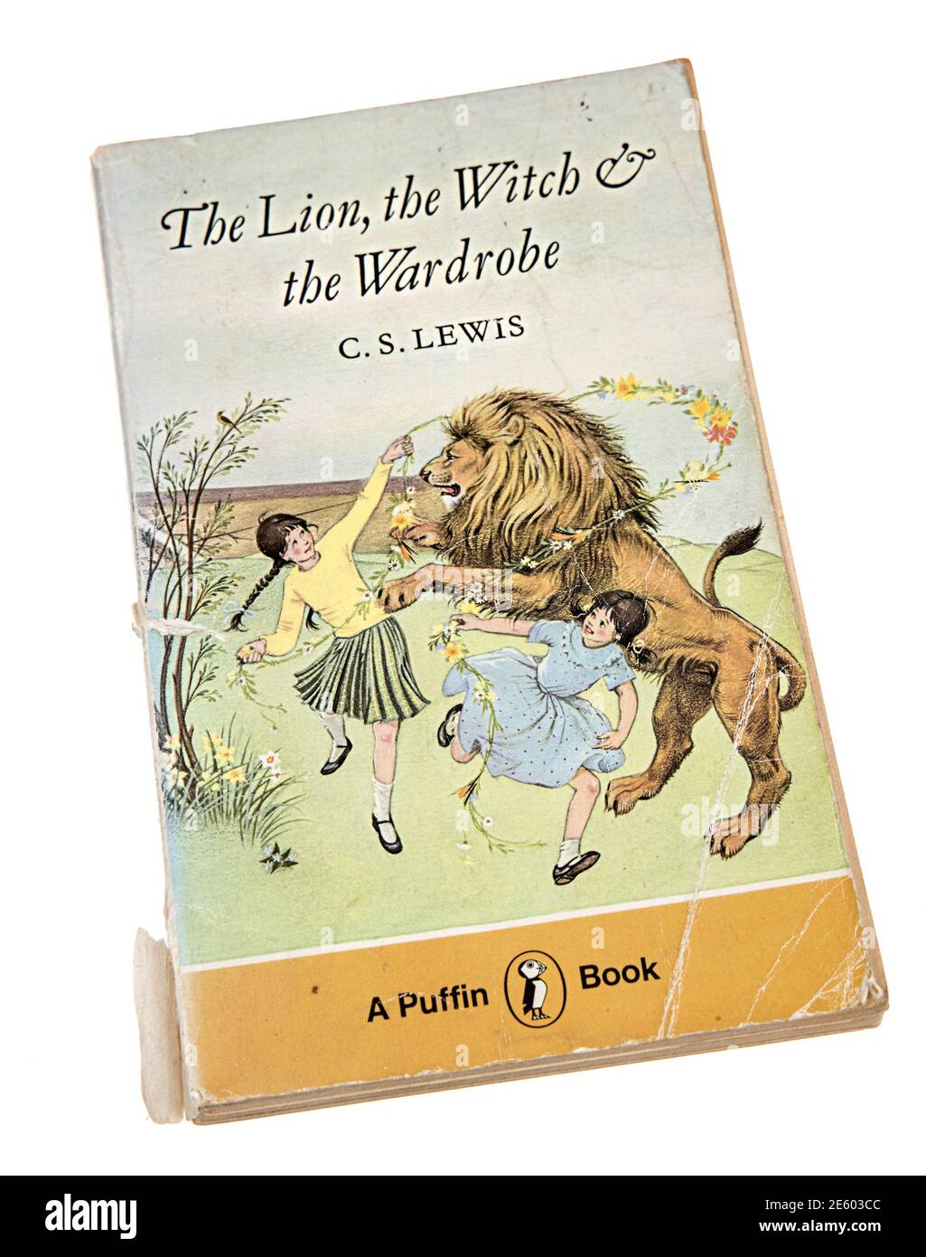 The Lion, the Witch and the Wardrobe paperback book by C.S. Lewis published by Puffin first published 1950 Stock Photo