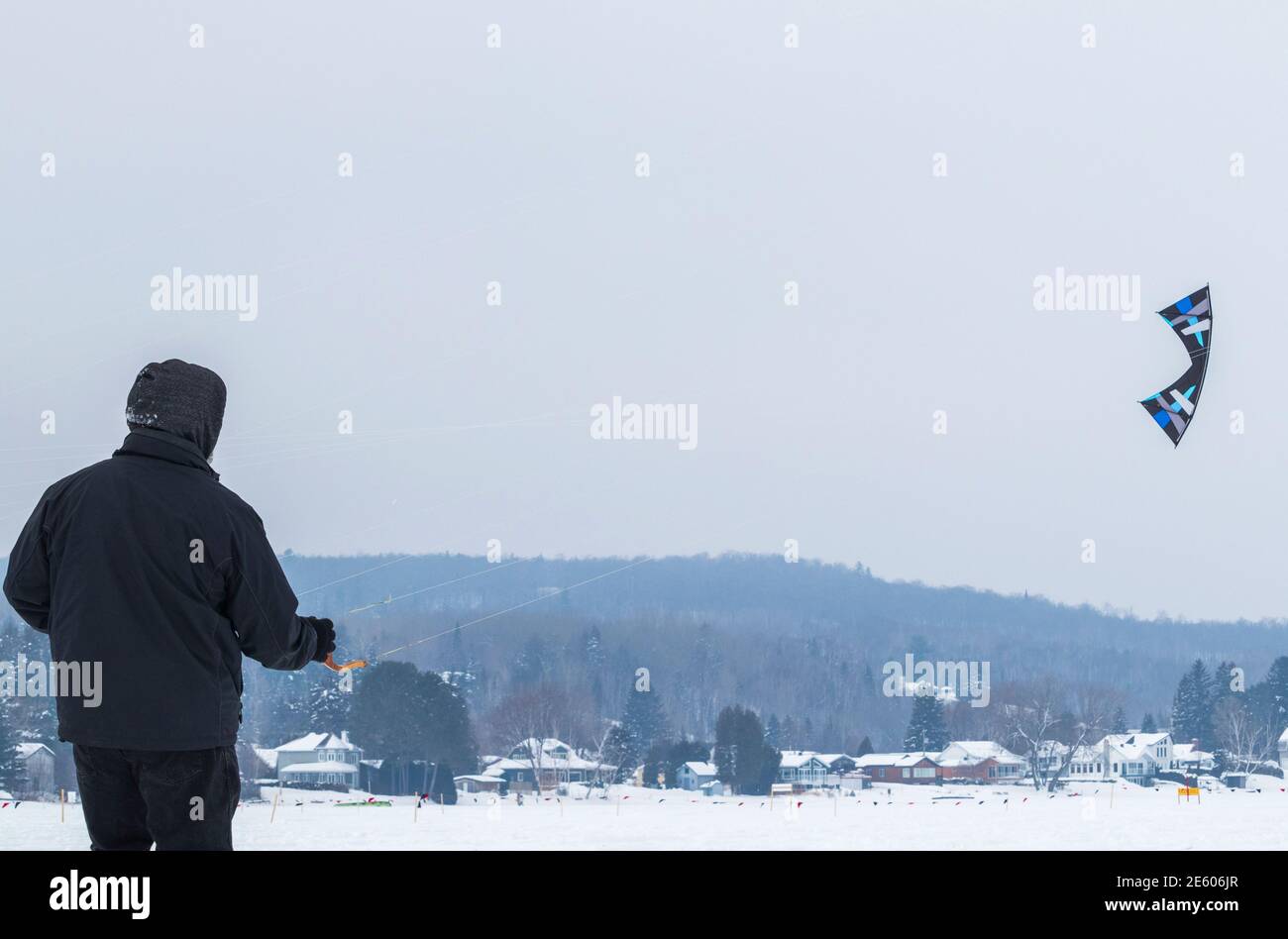 February 2, 2019 - Grandes-Piles, Qc, Canada: One person kiting during Kite Winter Festival (Festi-Volant) in Mauricie Stock Photo