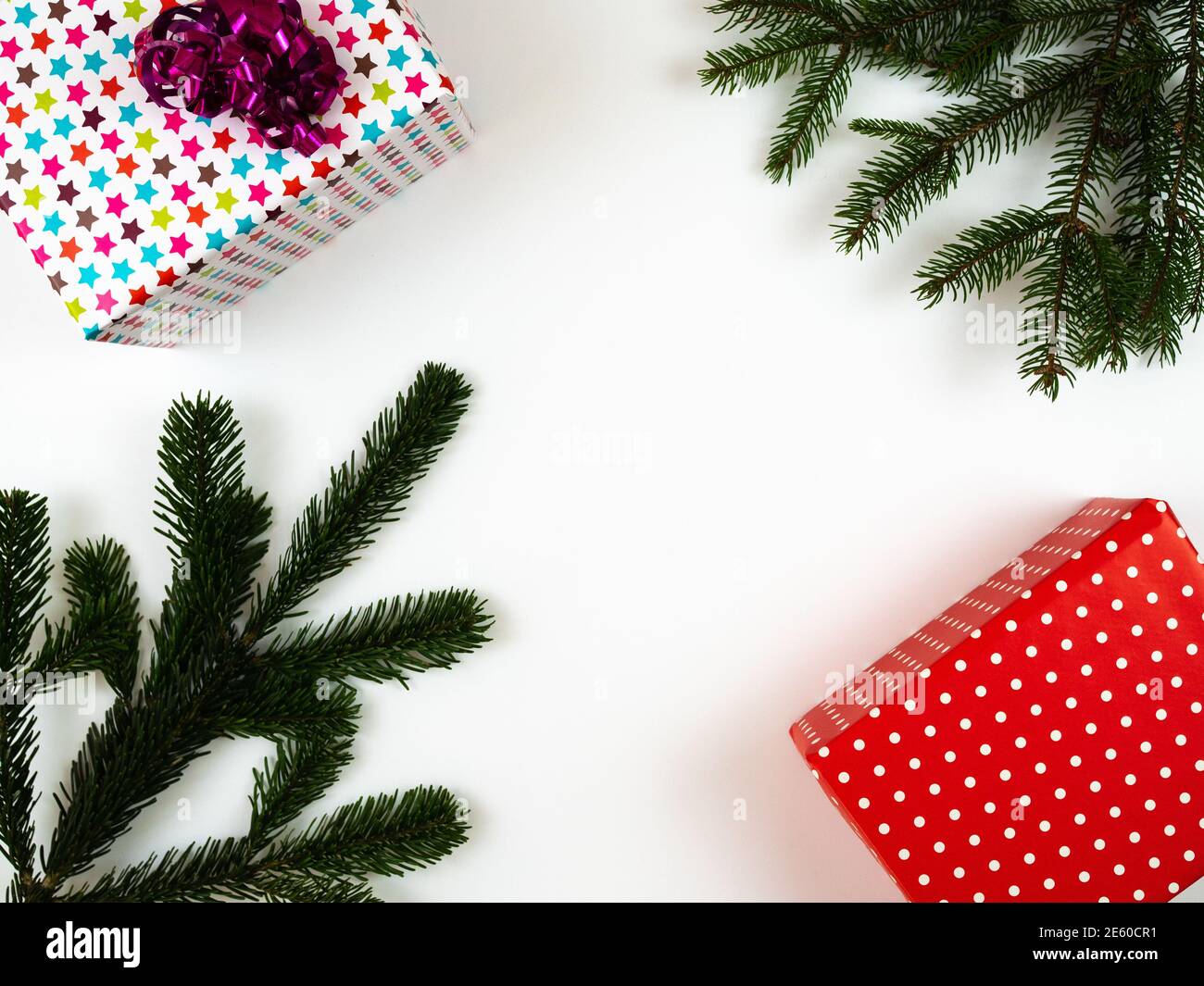 Christmas composition. Gift boxes and fir tree branches on white ...