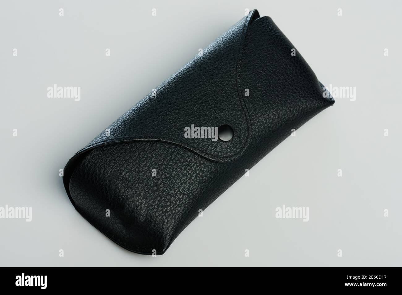 Black leather sunglasses case isolated on white studio background Stock