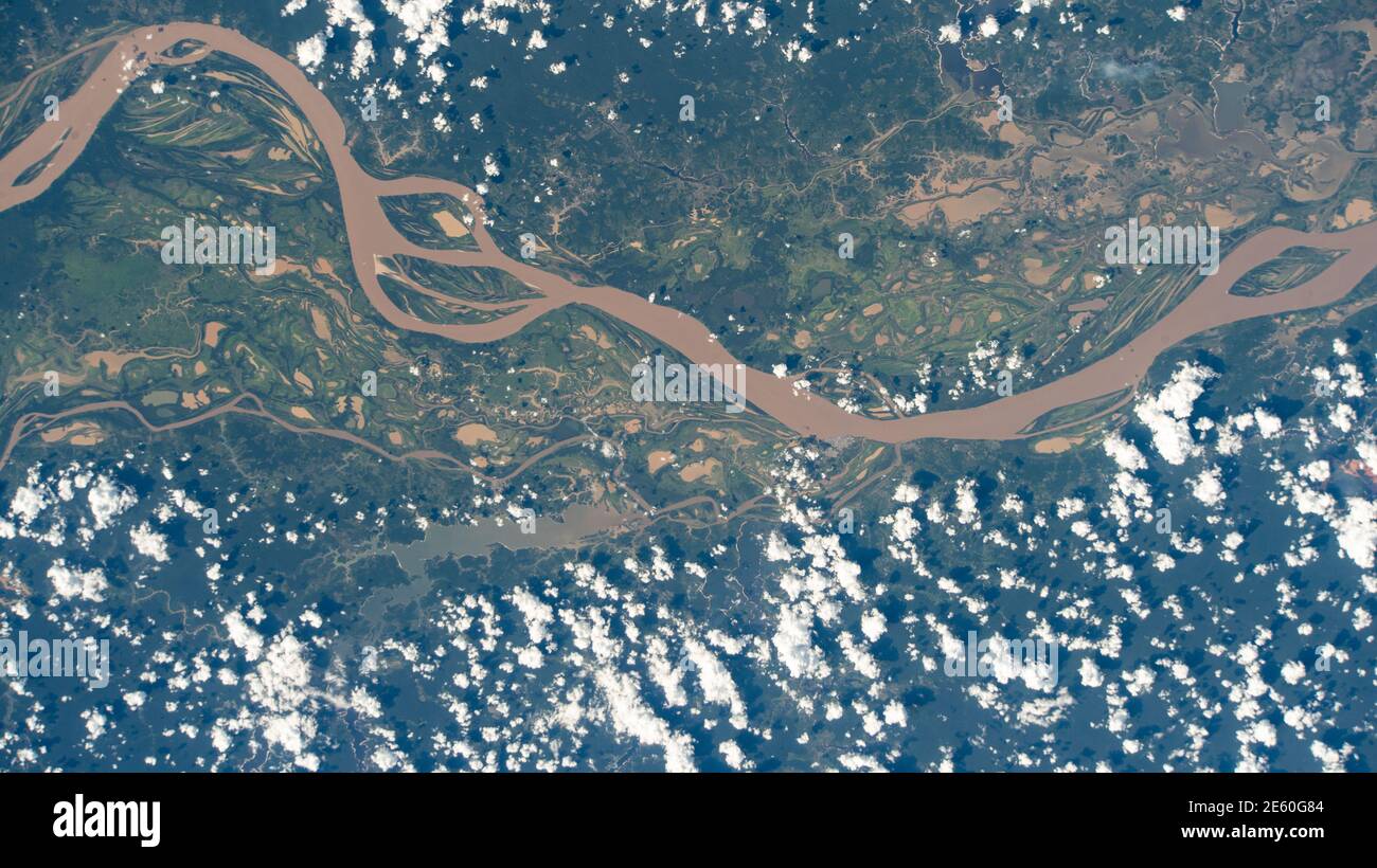 The Amazon River winds through Brazil as the International Space Station orbited 260 miles above the Earth. Stock Photo