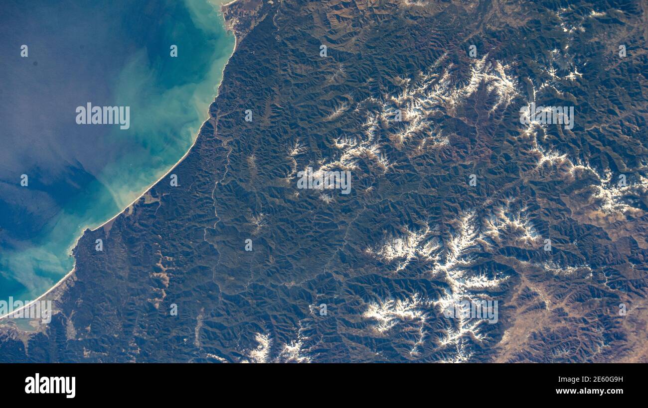 U.S. Redwood National and State Parks sprawl along the northern California coast as the International Space Station orbited 262 miles above the Pacific Ocean. Stock Photo