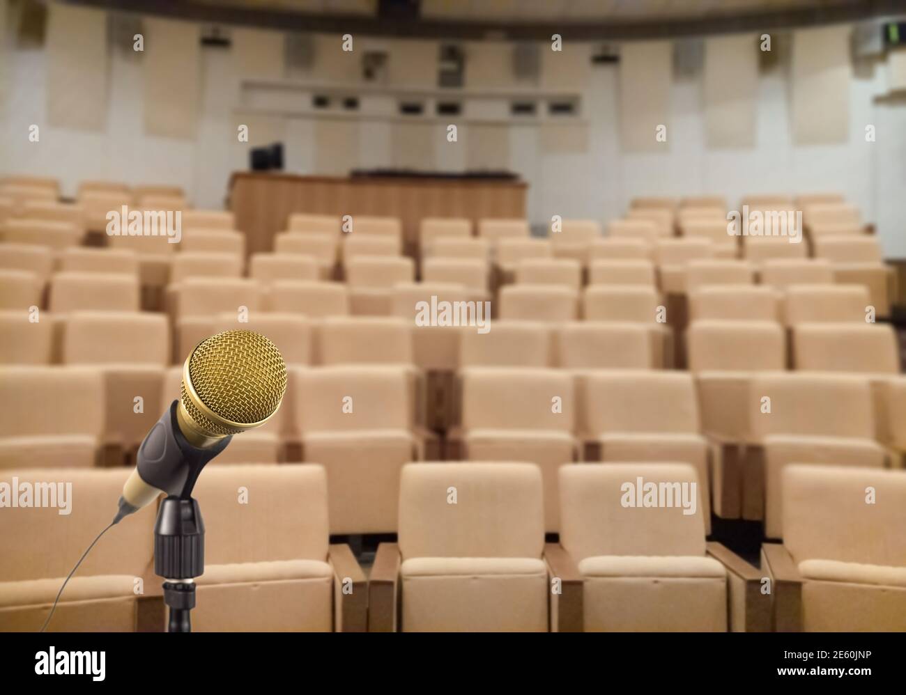 Microphone stand in empty auditorium before the meeting Stock Photo