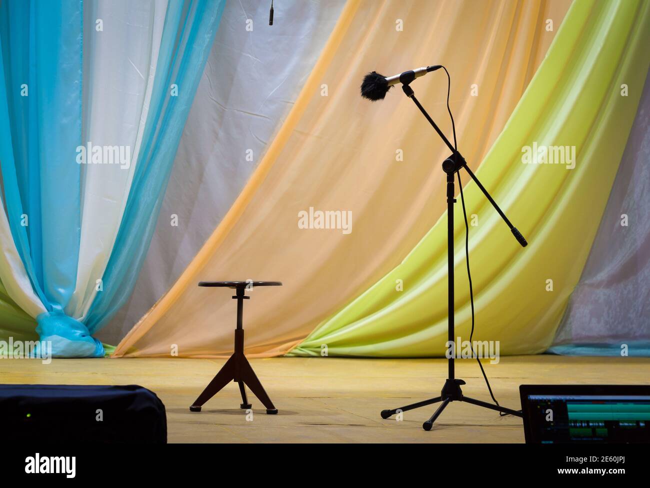 Ready for performance, microphone and stool on stage Stock Photo