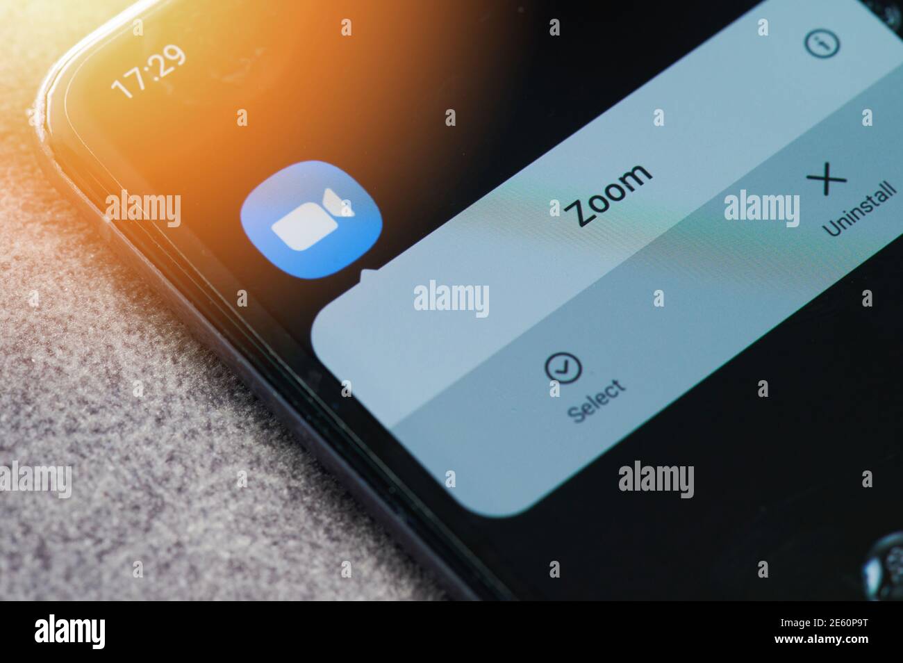 New york, USA - January 26, 2021: Open zoom app on smartphone screen close up view. Online meeting theme Stock Photo