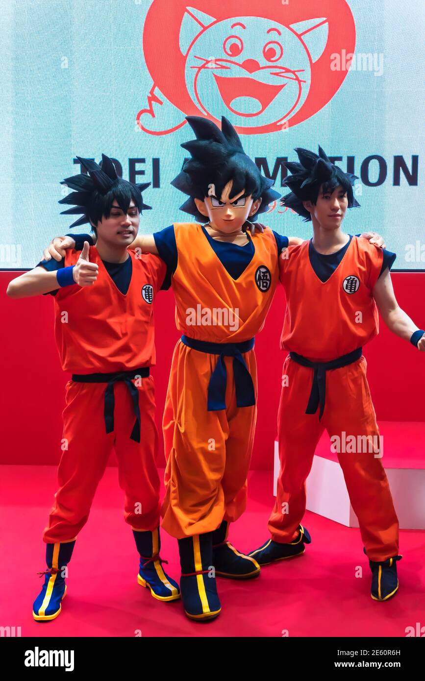 chiba, japan - december 22 2018: Three young men cosplayers wearing costume and wig of the character Son Goku of the manga and anime series of Dragon Stock Photo