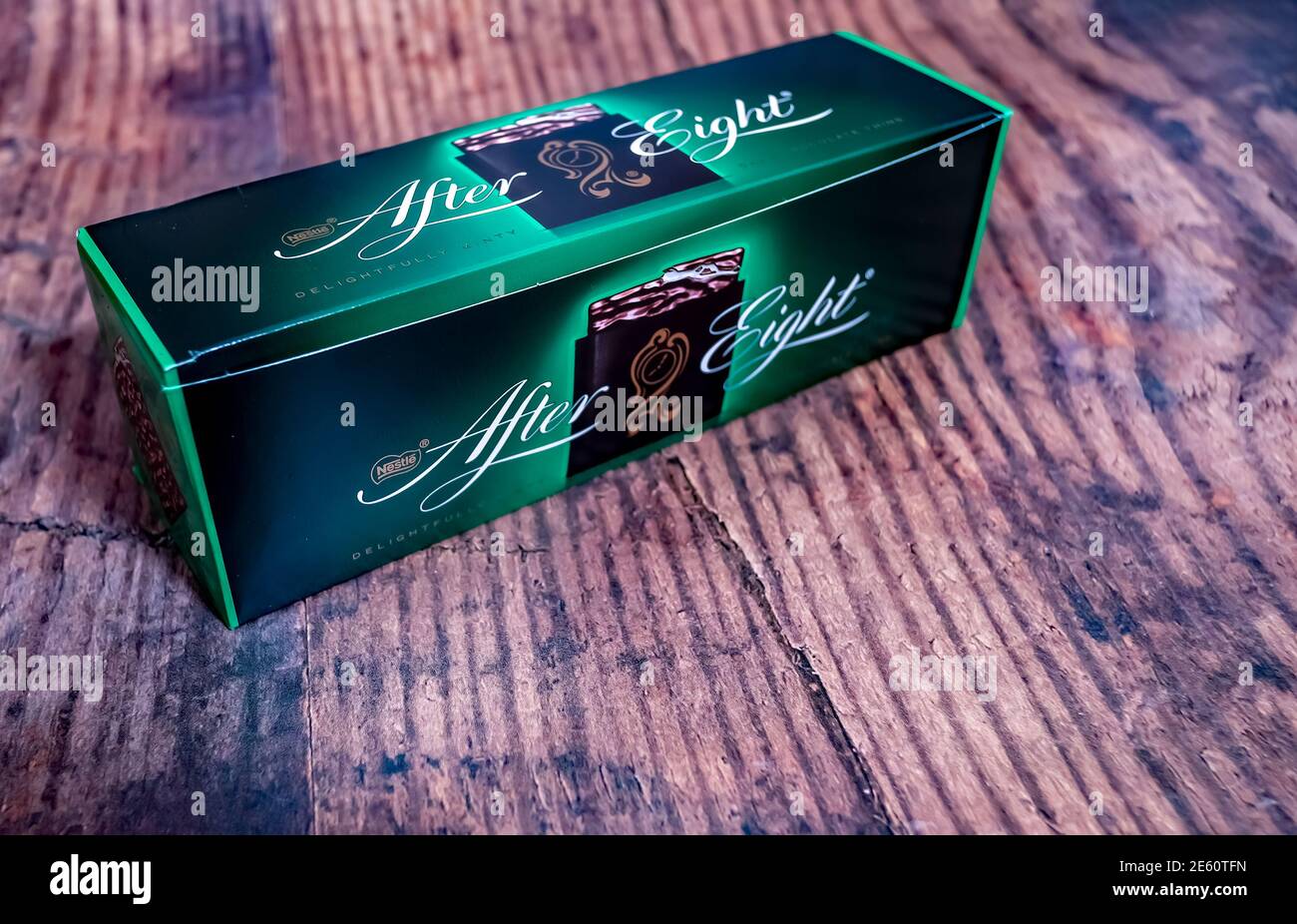 Norwich, Norfolk, UK – December 26 2020. An illustrative photo of a close up of a box of luxury After Eight after dinner mints on a wooden background Stock Photo