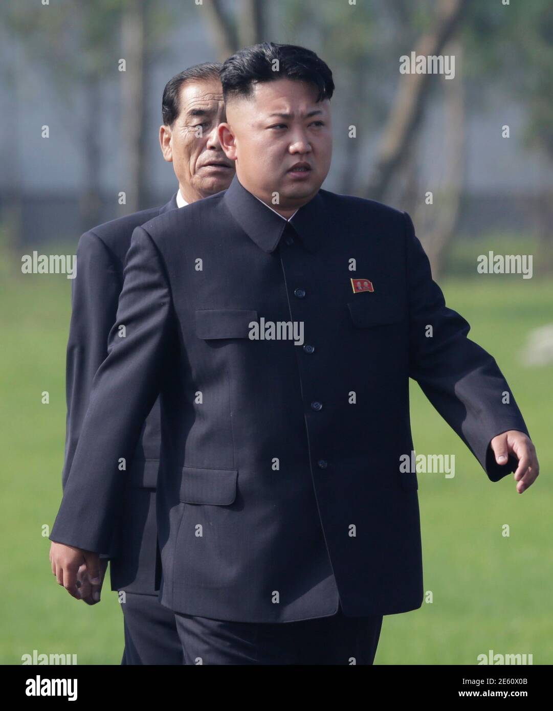 North Korean leader Kim Jong-un (front) and Premier Pak Pong-ju arrive for  the opening ceremony of the Cemetery of Fallen Fighters of the Korean  People's Army (KPA) in Pyongyang July 25, 2013,