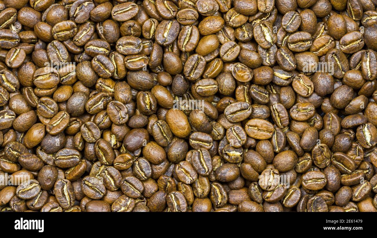 Coffee bean background, aromatic arabica roasted coffee Stock Photo - Alamy