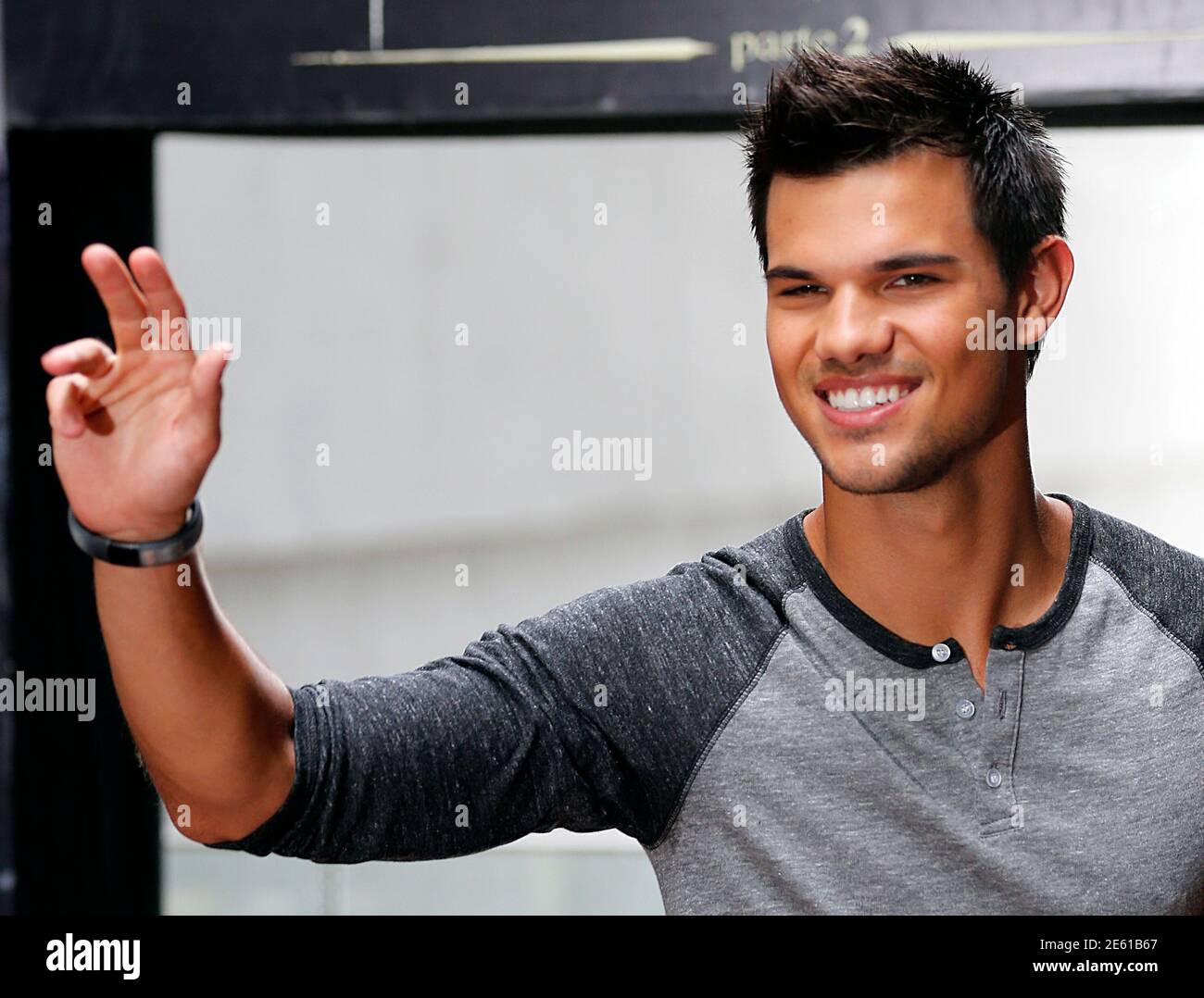 U.S. actor Taylor Lautner leaves a photocall of the film 'A saga crepusculo: Amanhecer' (The Twilight Saga - Breaking Dawn) in Rio de Janeiro October 24, 2012. REUTERS/Sergio Moraes (BRAZIL - Tags: ENTERTAINMENT) Stock Photo