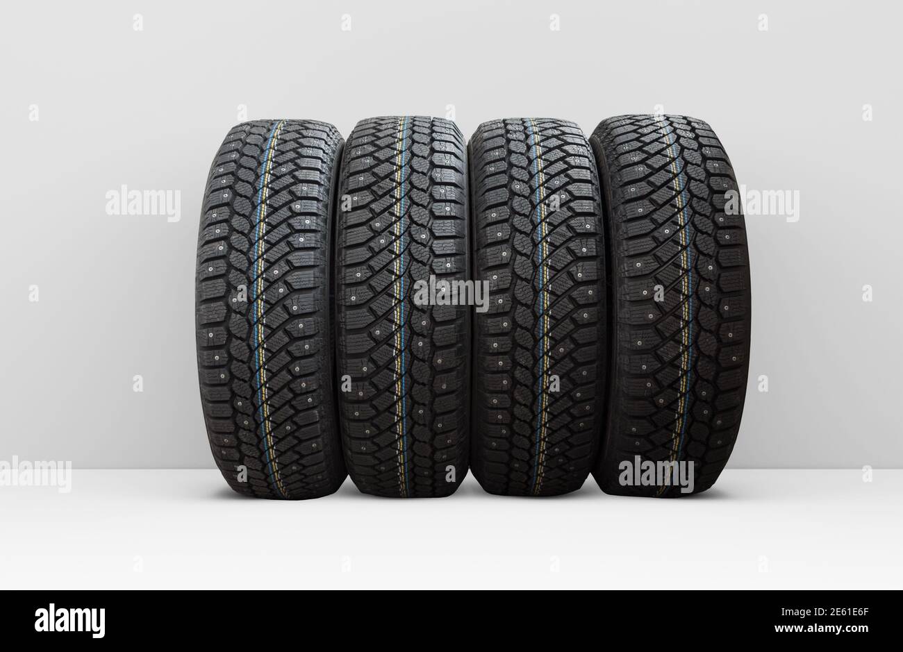 Four winter car tires with snow spikes, isolated Stock Photo Alamy
