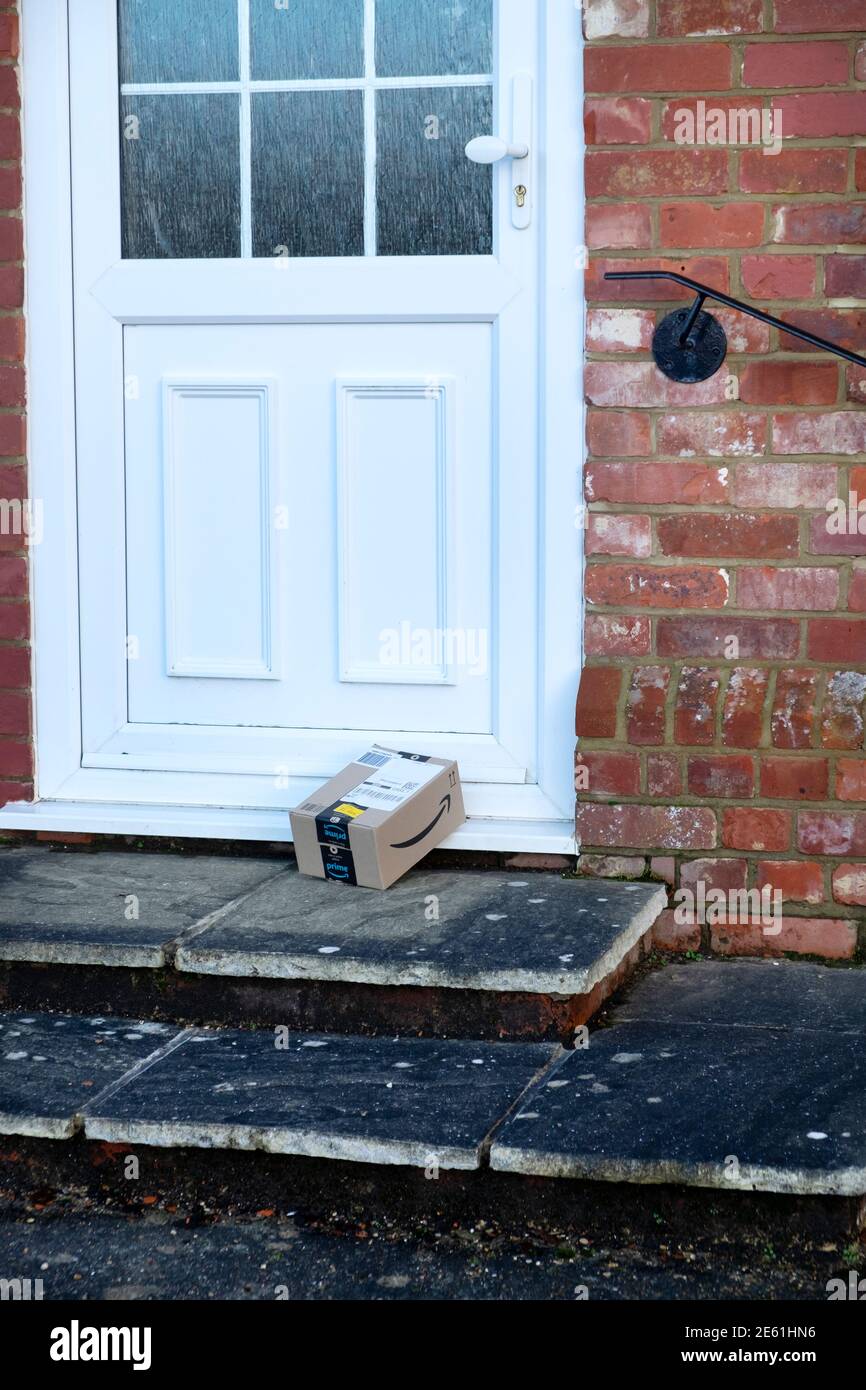 An Amazon Prime package left on a doorstep Stock Photo