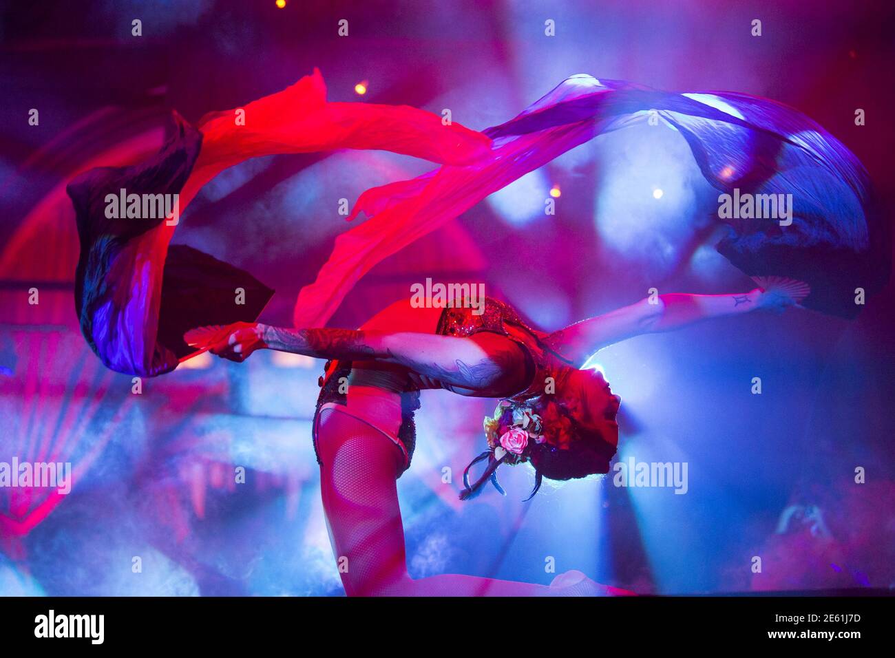 A contortionist performs at a party following a screening of "American