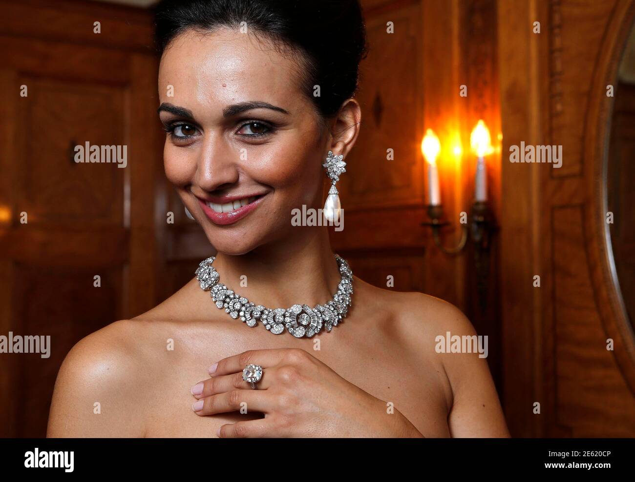 A Model Wears A Diamond Necklace/bracelet By Bulgari (1954) A Natural Pearl  And Diamond Pendant Earrings(1962) And A Diamond Ring (1962) During An  Auction Preview At Sotheby's In Geneva May 7, |