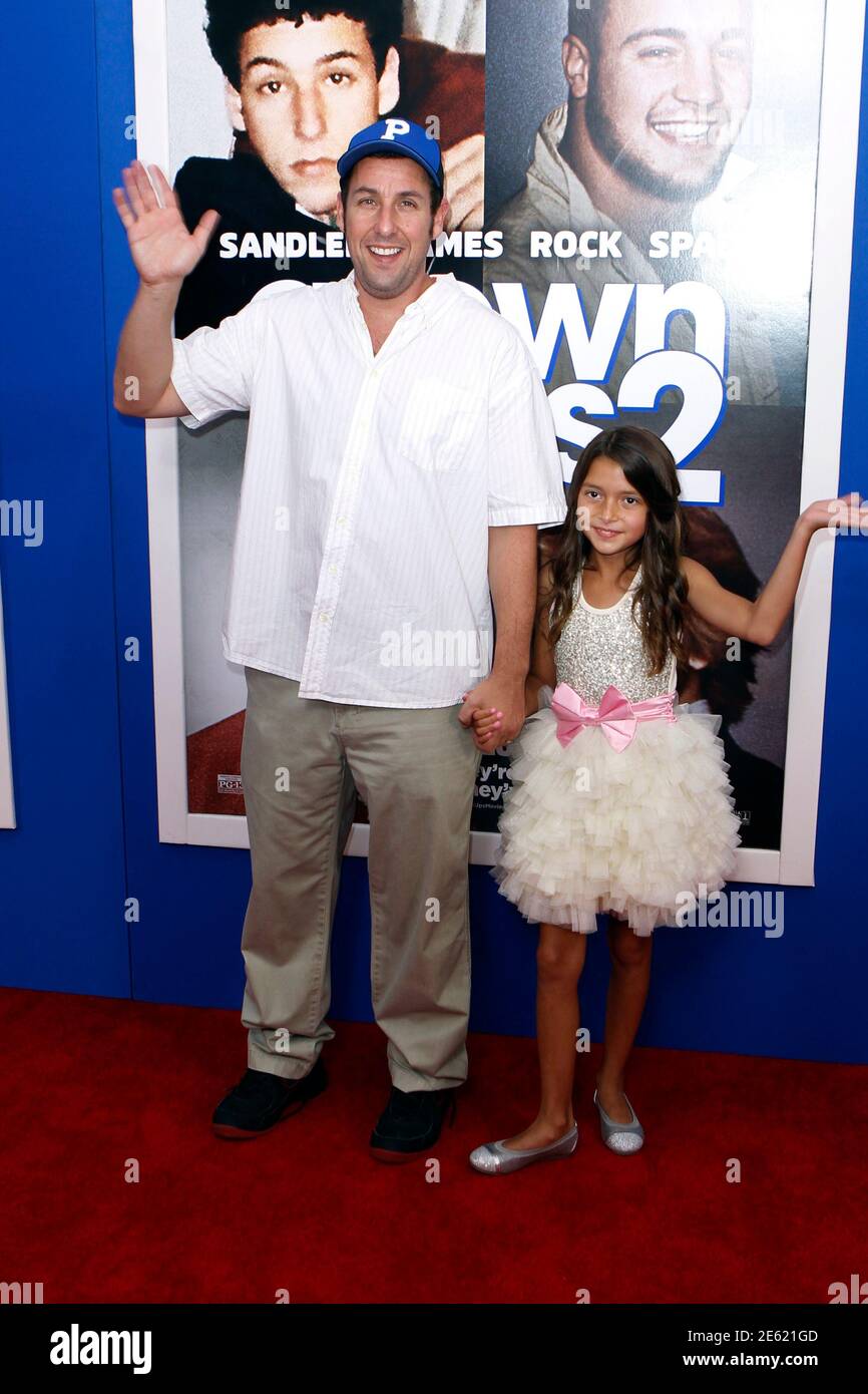 Cast Members Adam Sandler And Alexys Nycole Sanchez Arrive For The Premiere Of The Film Grown Ups 2 In New York July 10 2013 Reuters Lucas Jackson United States Tags Entertainment Stock