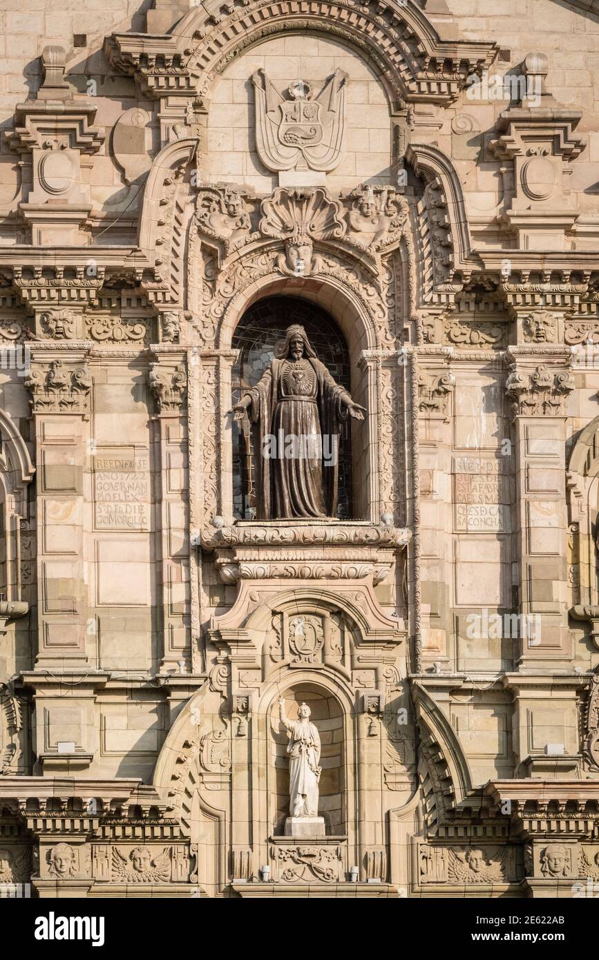 Architectural detail and statues on facade of Catedral de Lima, the Roman Catholic cathedral on Plaza Mayor in Lima, Peru. Stock Photo