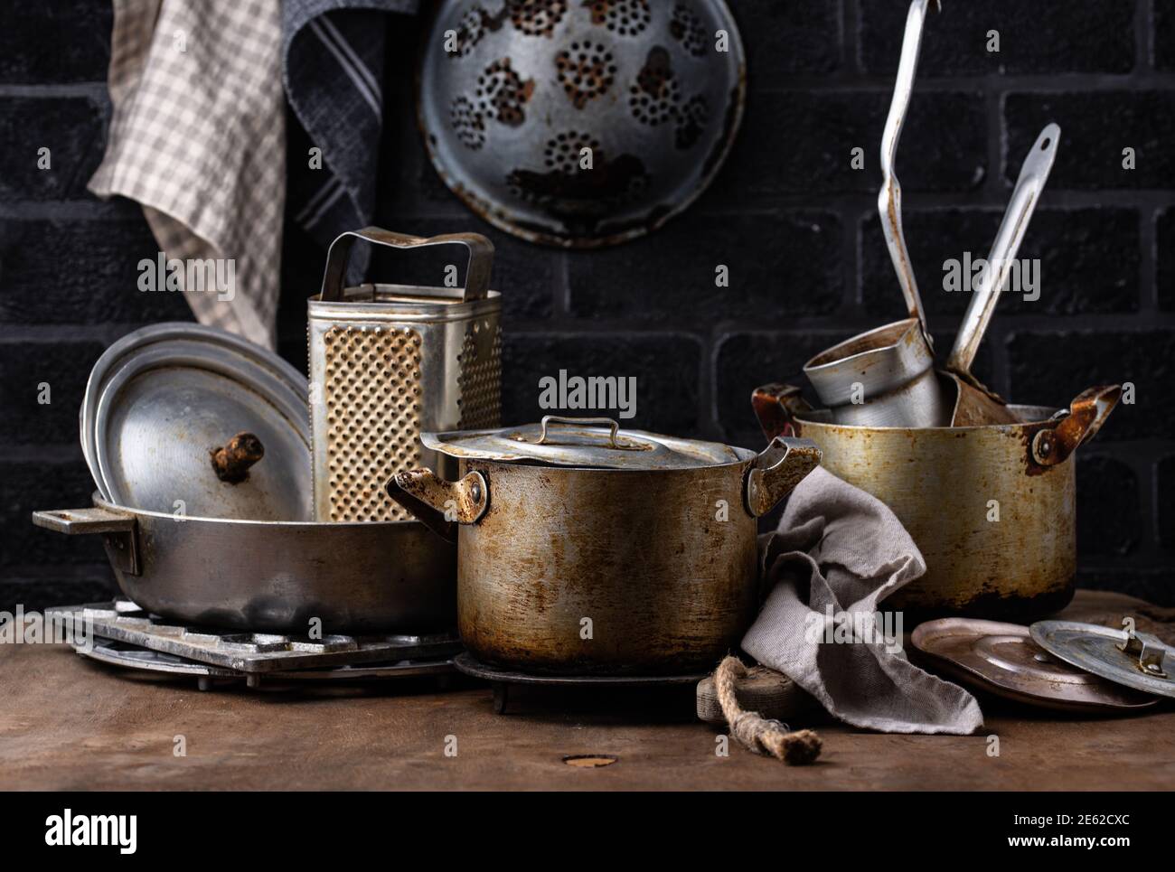 Old vintage iron pots and metallic dish Stock Photo Alamy