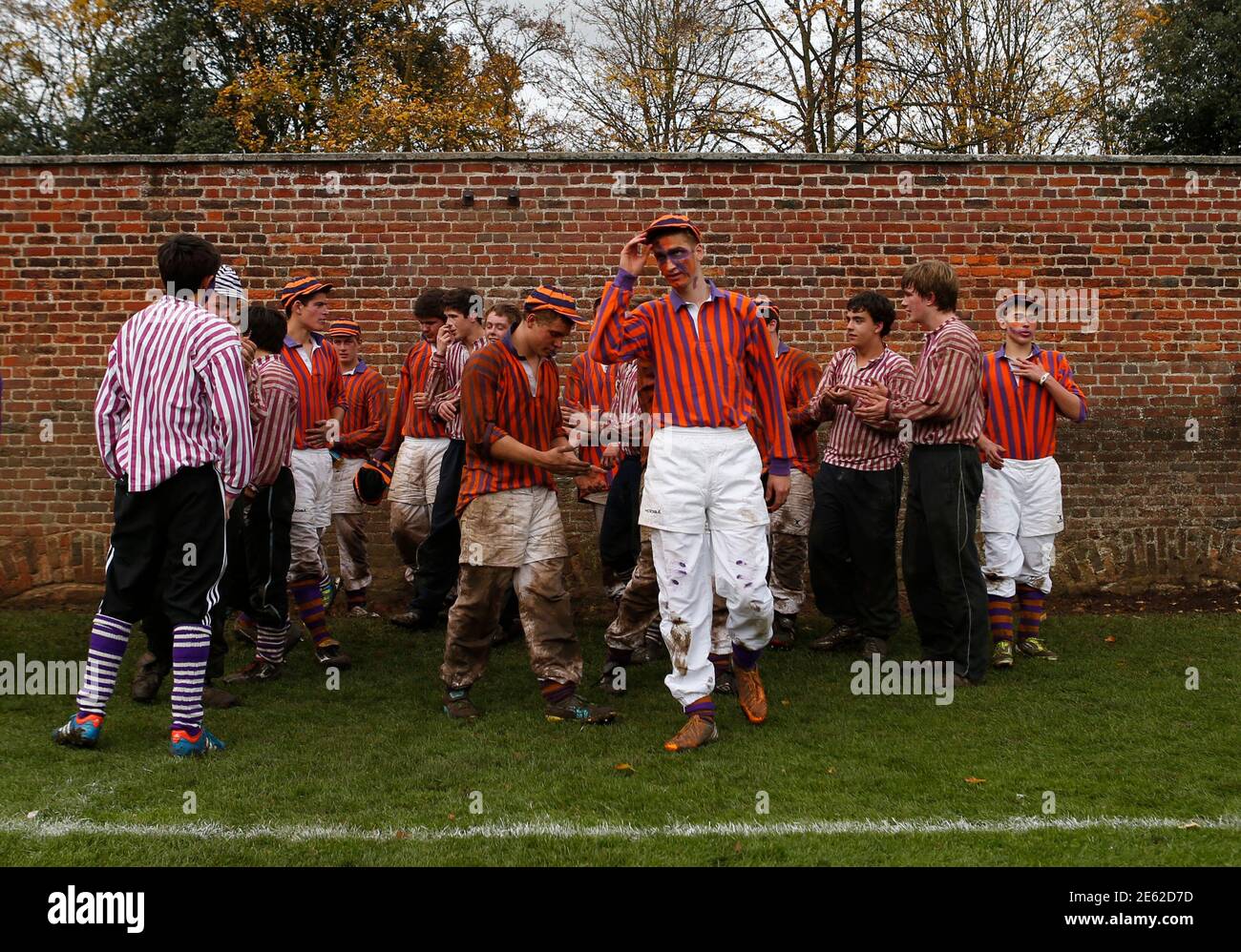 The Collegers and the Oppidans teams compete during the Eton Wall Game at  Eton college in Eton November 17, 2012. Originating in 1766, the game is  played on a narrow strip 110