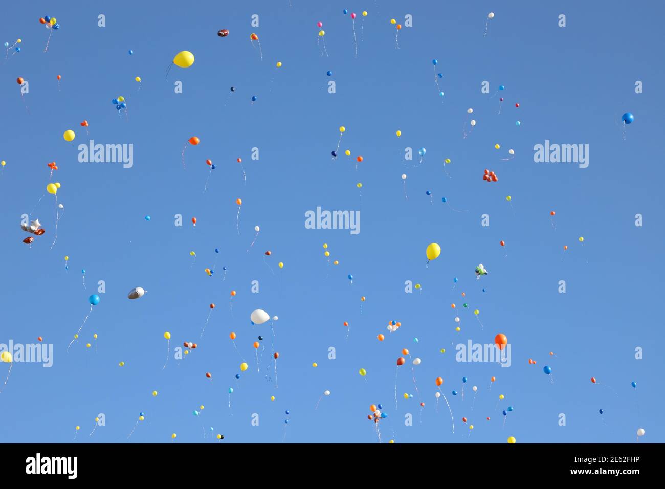 Balloons flying in the sky Stock Photo