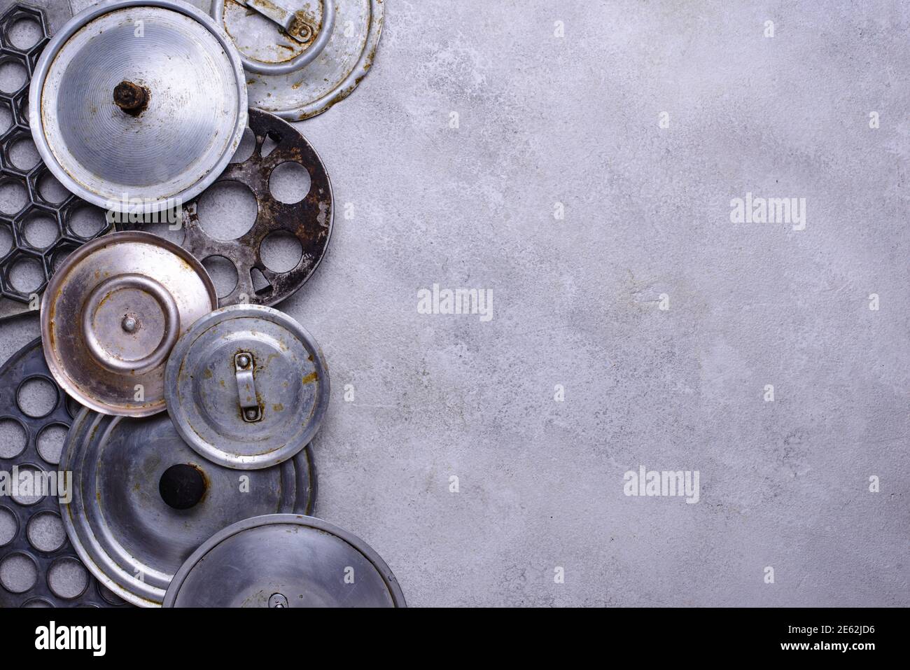 Old iron lids for vintage pot Stock Photo Alamy