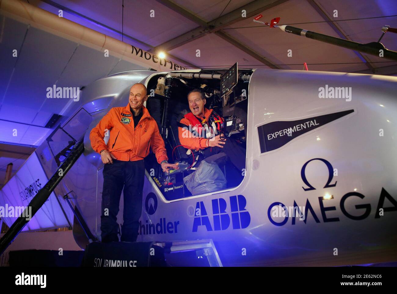 Swiss Pilots Andre Borschberg And Bertrand Piccard L Smile Before Flying The Solar Impulse 2 At Al Bateen Airport In Abu Dhabi March 9 2015 Piccard And Borschberg Attempting The First Flight