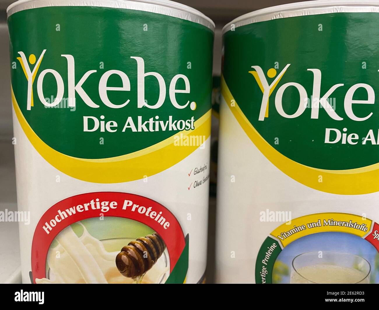Viersen, Germany - January 9. 2021: Closeup of Yokebe protein diet shake powder cans in shelf of german supermarket Stock Photo