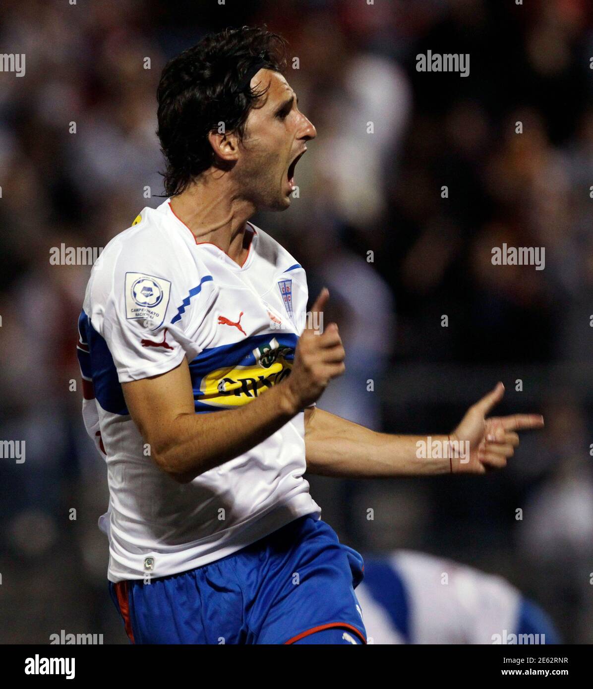Pablo Calandria Of Chile S Universidad Catolica Reacts After Scoring Against Venezuela S Caracas Fc During Their Copa Libertadores Soccer Match In Santiago March 9 2011 Reuters Ivan Alvarado Chile Tags Sport Soccer Stock