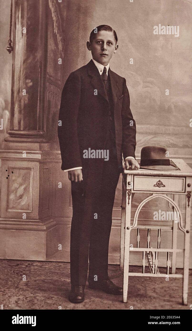 portrait of a man sharply dressed in a suit with telephone The call vintage lithographic photo print