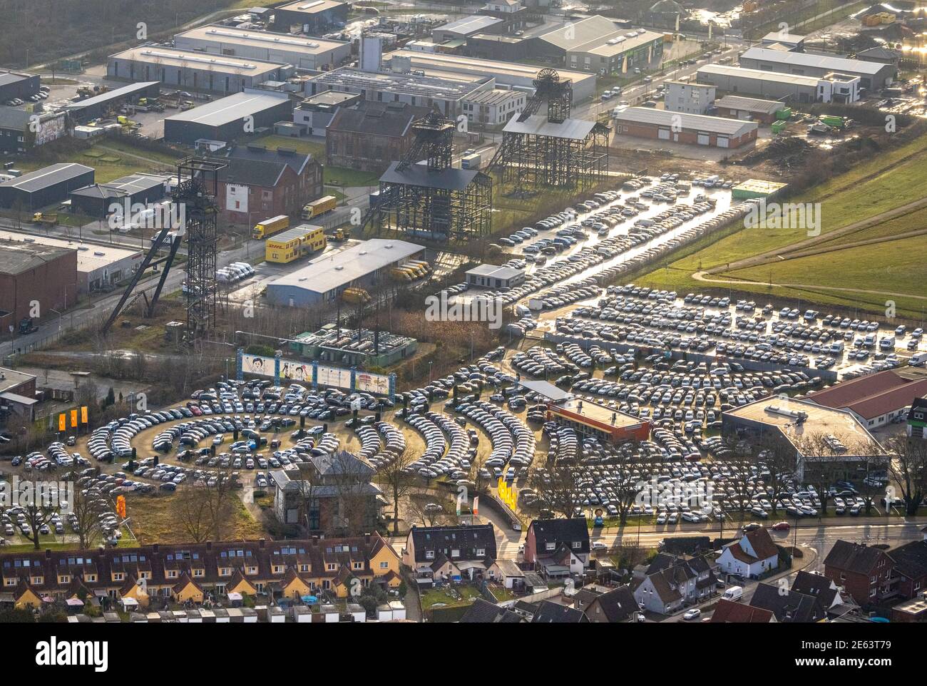 Aerial view Radbod Colliery, Radbod Shaft 1+2 At the winding towers, Skoda Potthoff car dealer Potti parking lots in Hamm, Ruhr Area, North Rhine-West Stock Photo