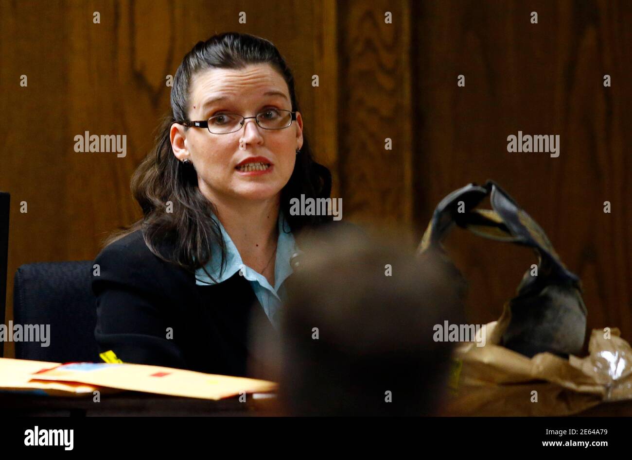texas-dps-forensic-scientist-amber-moss-responds-to-a-question-from-defense-attorney-j-warren-st-john-during-the-capital-murder-trial-of-former-marine-cpl-eddie-ray-routh-at-the-erath