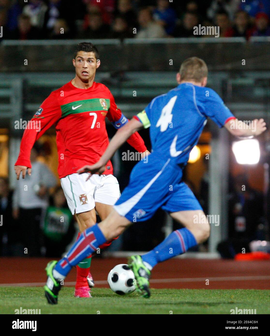 Cristiano Ronaldo L Controls The Ball Near Iceland S Kristjan Orn Sigurosson During Their Euro 12 Qualification Soccer Match In Reykjavik October 12 10 Reuters Ingolfur Juliusson Iceland s Sport Soccer Stock Photo Alamy
