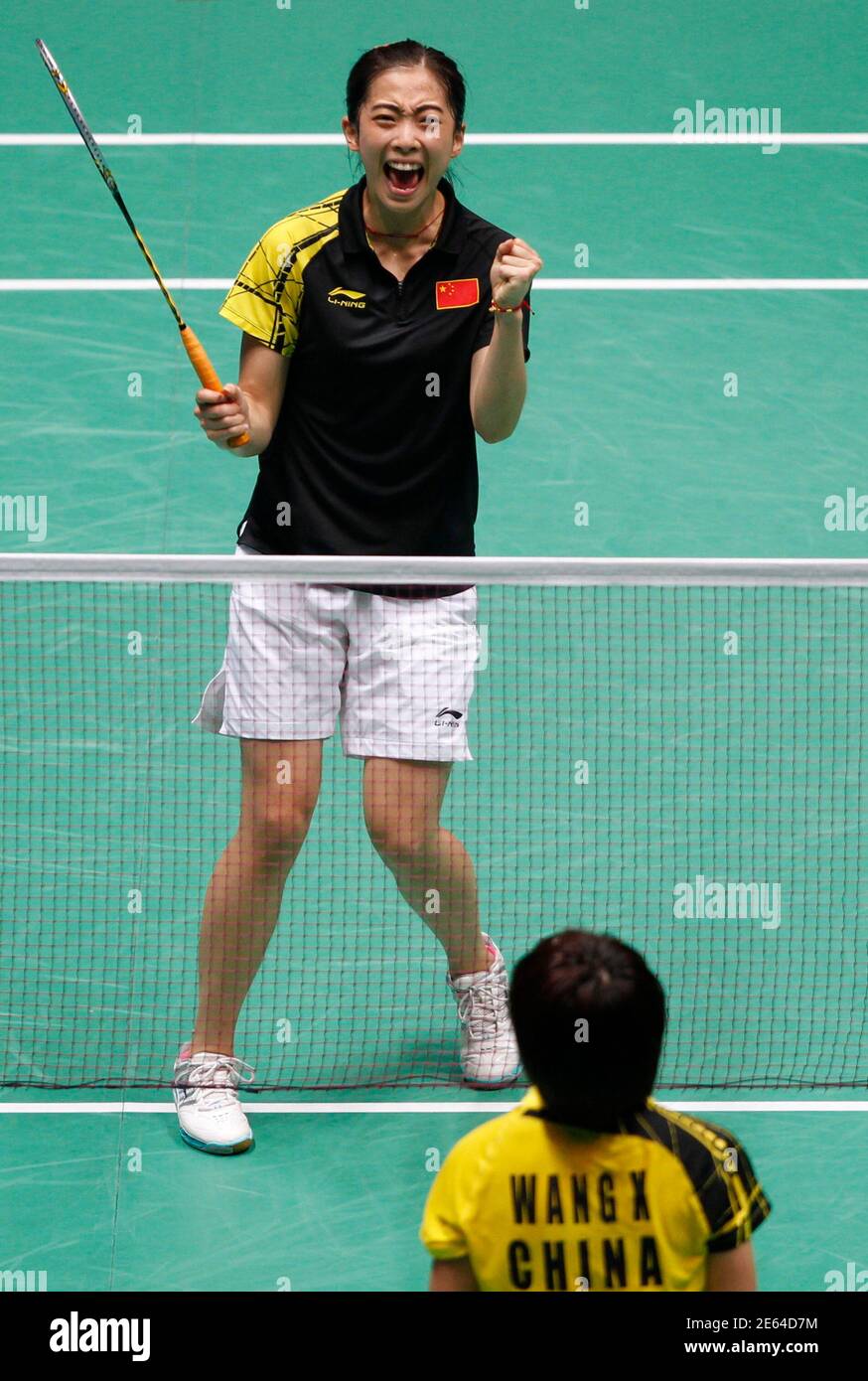 Chinau0027s Wang Shixian celebrates her win over compatriot Wang Xin 