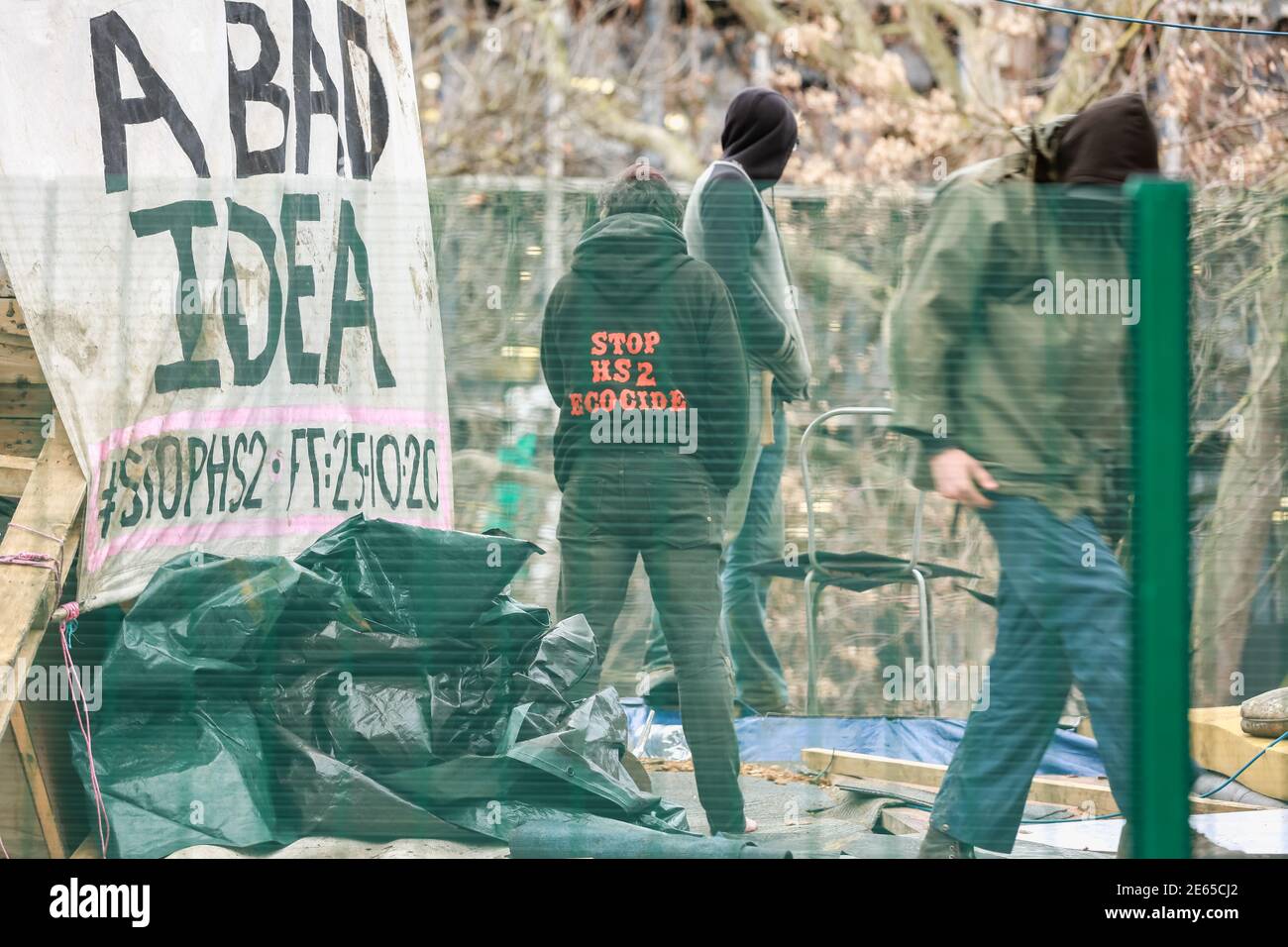 London, UK. 28 Jan 2021. 'Stop HS2 Ecocide' written on a HS2 Rebellion protester's hoodie in Euston Square Gardens. Credit: Waldemar Sikora Stock Photo