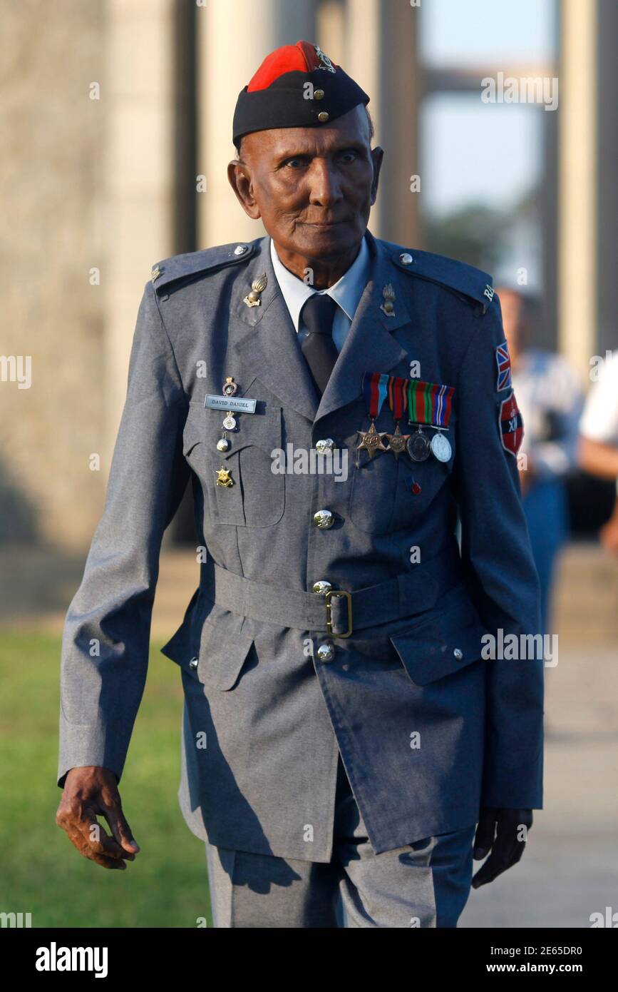 David Daniel (R), a 86-year old Second World War Veteran British Artillery Man, visits Taukkyan War Cemetery, on the outskirts of Yangon, November 17, 2011. REUTERS/Soe Zeya Tun  (MYANMAR - Tags: POLITICS) Stock Photo