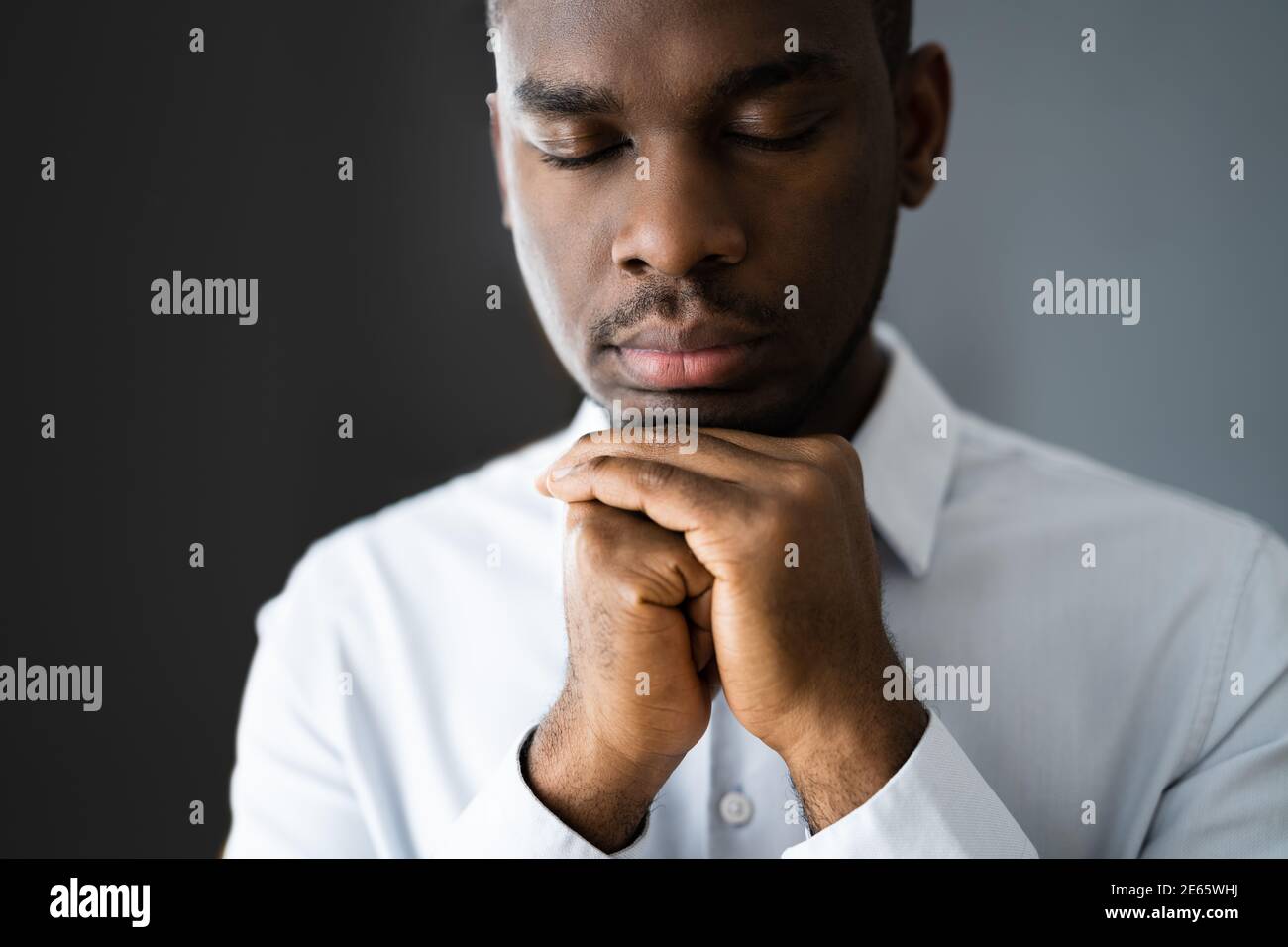African American Man Praying And Seeking God Stock Photo