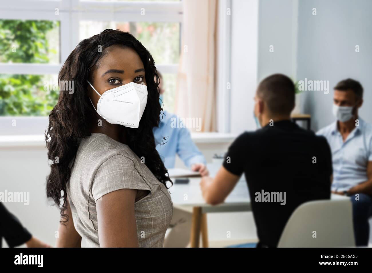 African American Employee Woman Wearing Face Mask Stock Photo Alamy