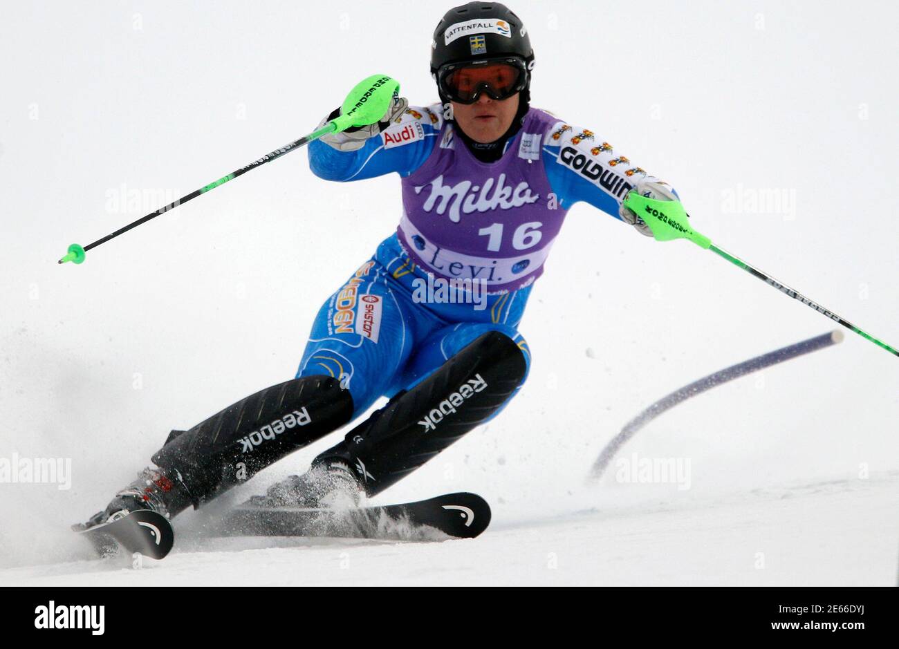 Sweden's Anja Paerson clears a gate during her first run in the women's