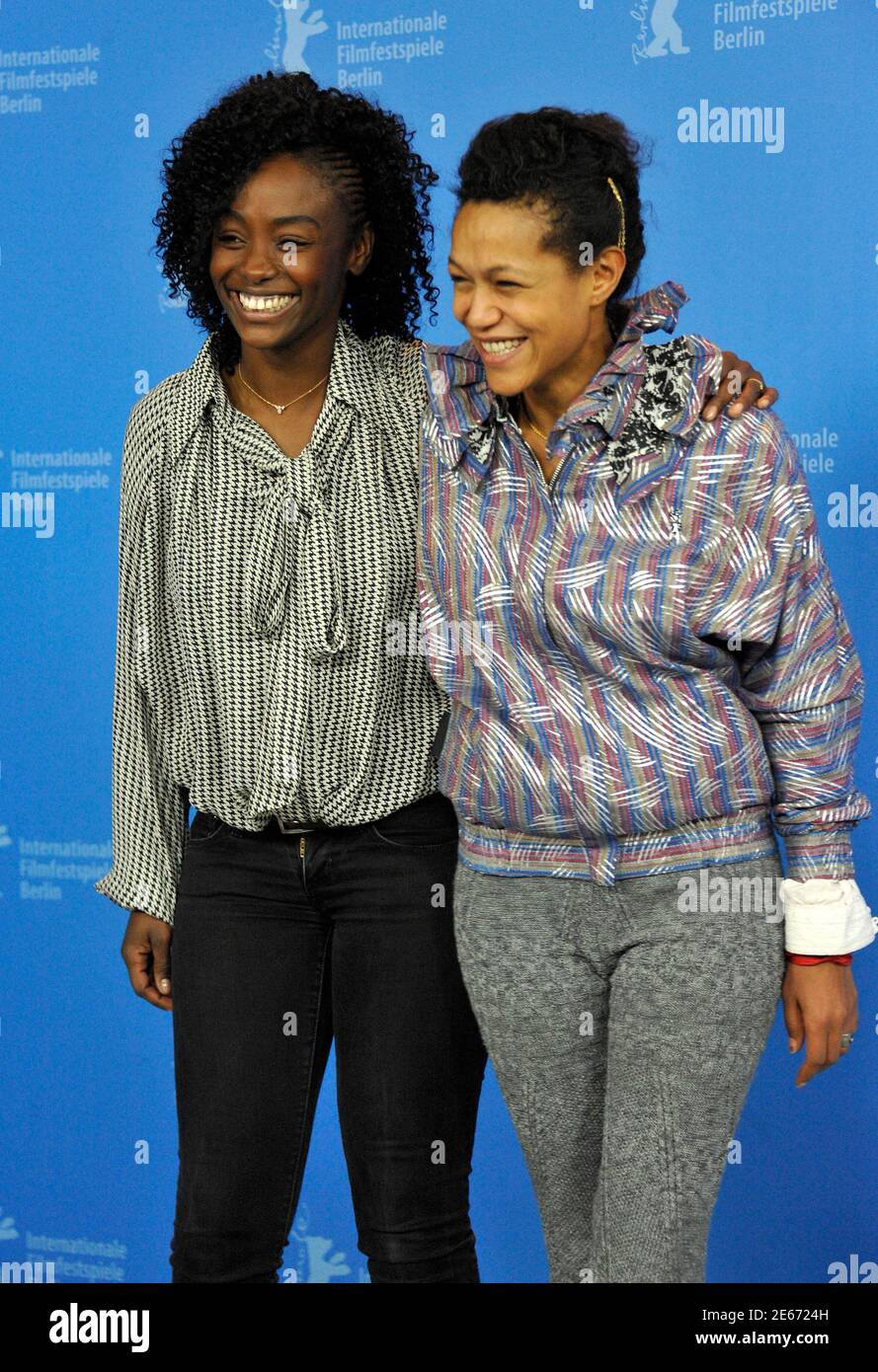 Actresses Aissa Maiga (L) and Anisia Uzeyman attend a photocall to promote the movie "Aujourd'hui - Tey" at the 62nd Berlinale International Film Festival in Berlin February 10, 2012.  REUTERS/Morris Mac Matzen  (GERMANY - Tags: ENTERTAINMENT) Stock Photo