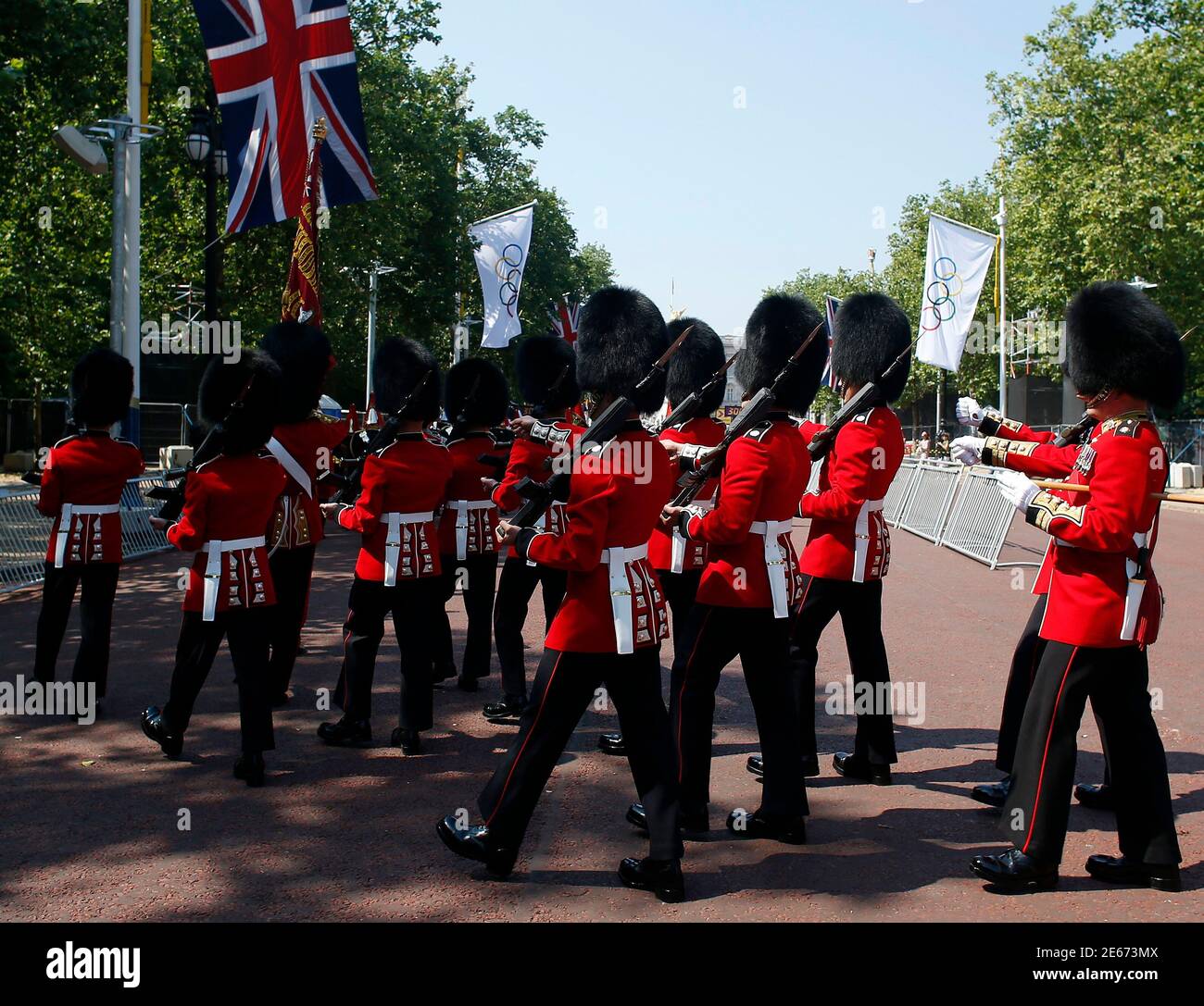 Guardsmen march down The Mall which will serve as the start and finish  area for the road cycling race event at the London 2012 Olympic Games July 26, 2012.  REUTERS/Paul Hanna  (BRITAIN - Tags: SPORT OLYMPICS) Stock Photo