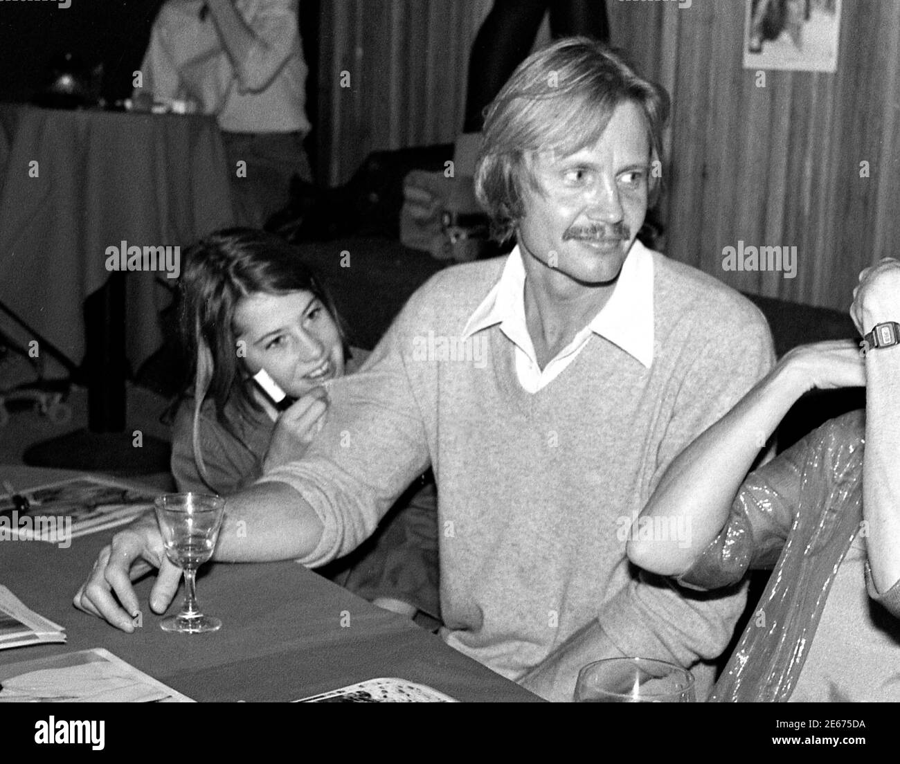 Jon Voigt and Jane Fonda autogrpahing photos at Flippers Roller Disco event in support of ERA, LosAngeles, OCt. 29, 1978 Stock Photo