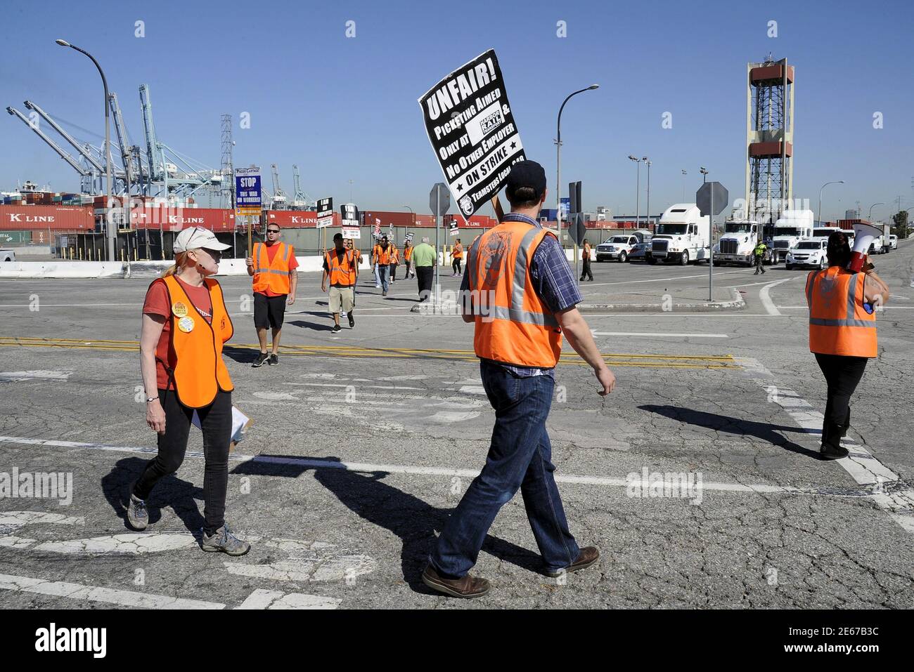 Striking trucker drivers and members of International Brotherhood of  Teamsters walk the picket line at the Port of Long Beach in California,  United States April 27, 2015. Tractor-trailer drivers who haul freight