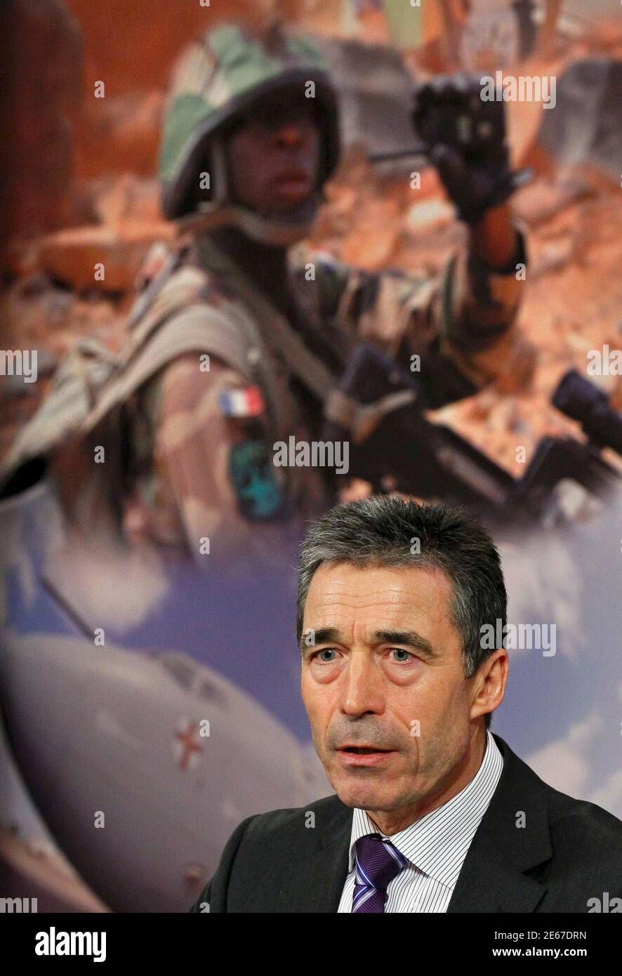 NATO Secretary General Anders Fogh Rasmussen holds a news conference during a NATO defence ministers meeting (NAC) at the Alliance headquarters in Brussels March 10, 2011. NATO defence ministers meeting in Brussels on Thursday and Friday will discuss options to respond to the turmoil in Libya, including a possible no-fly zone, officials said.      REUTERS/Yves Herman (BELGIUM  - Tags: POLITICS CONFLICT MILITARY) Stock Photo