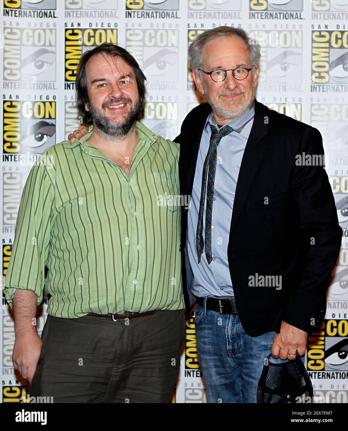 Director Steven Spielberg makes his inaugural appearance at Comic Con with the help of friend and producer Peter Jackson in promotion of their upcoming motion picture 'The Adventures of Tin Tin' at the pop culture event in San Diego, California July 22, 2011.   REUTERS/Mike Blake  (UNITED STATES - Tags: SOCIETY PROFILE ENTERTAINMENT) Stock Photo