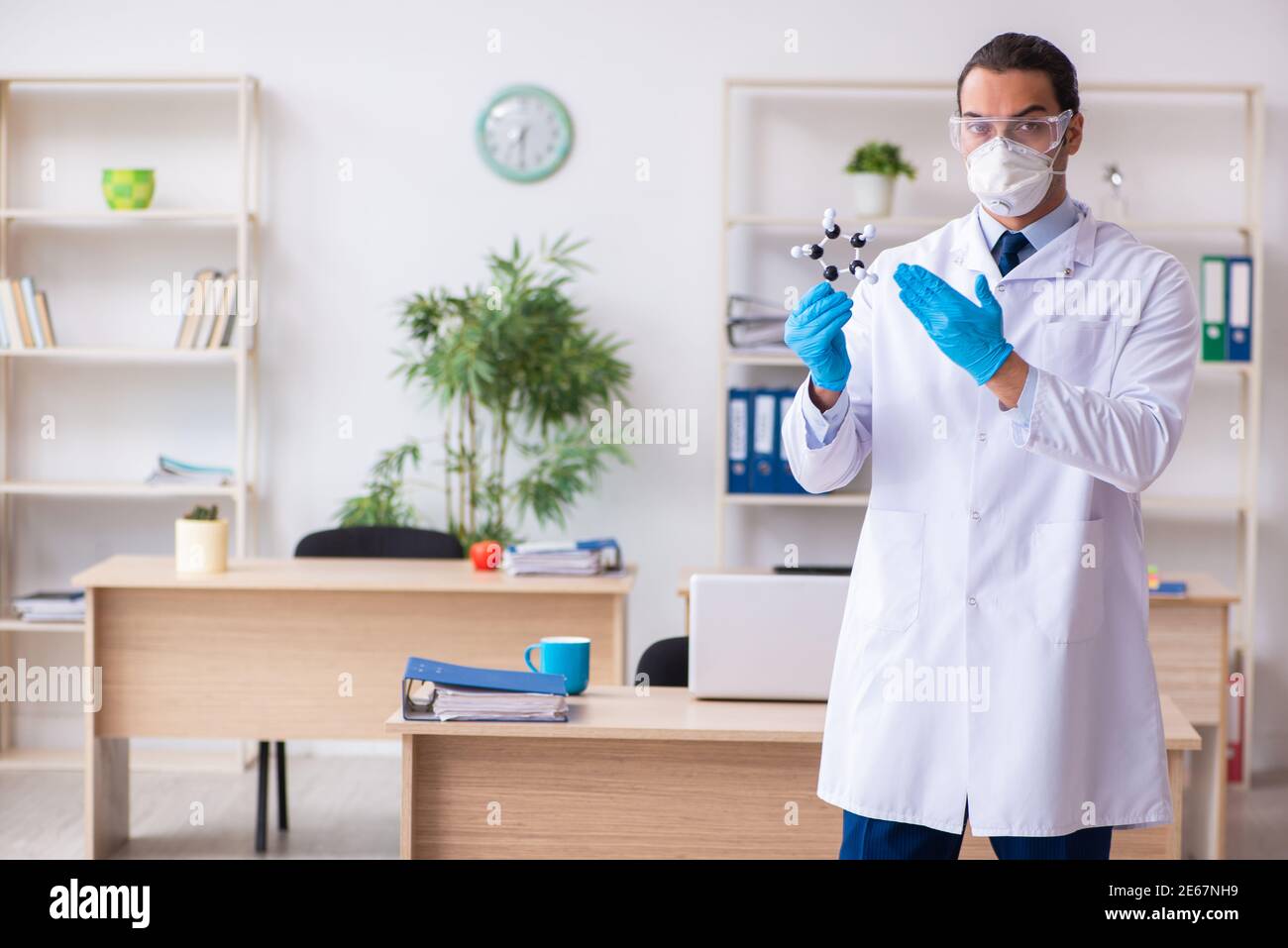 Young doctor virologist in the office Stock Photo