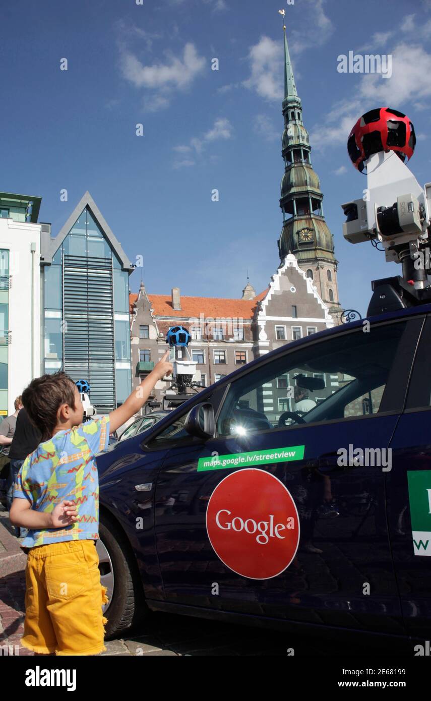 https www alamy com a boy points at a google street view car during a media event in riga august 26 2011 google has started capturing images of several cities in latvia to operate its street view application in the country according to the company street view which enables users of google maps to view photos of streets as well has been around since 2007 sending its cars out to take photos of city streets and covers about 30 countries including the united states many in europe australia south africa and japan reutersints kalnins latvia tags transport sci tech business image399703061 html