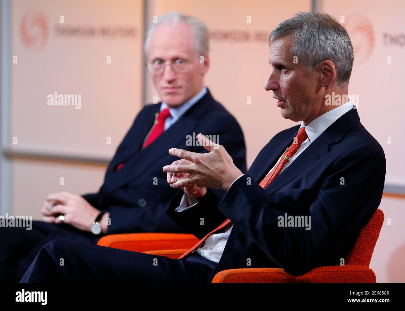 Martin Wheatley (R), the CEO designate of the new Financial Conduct Authority (FCA) speaks at a Thomson Reuters Newsmaker event, in the Canary Wharf business district of east London October 16, 2012.      REUTERS/Andrew Winning (BRITAIN - Tags: BUSINESS POLITICS) Stock Photo