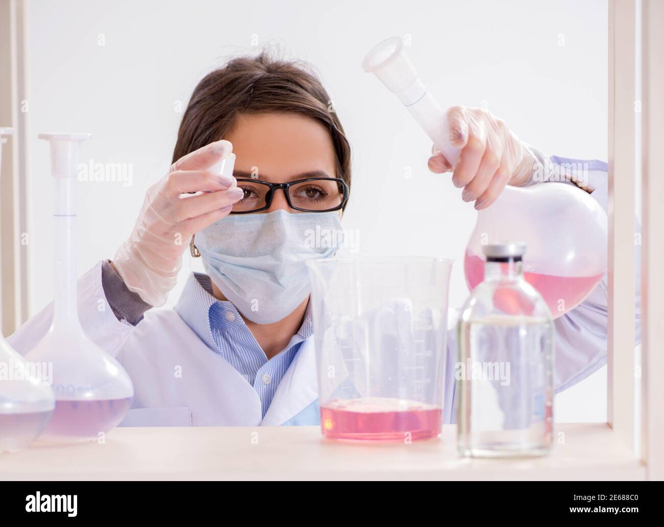 The Female Chemist Working In Hospital Lab Stock Photo - Alamy