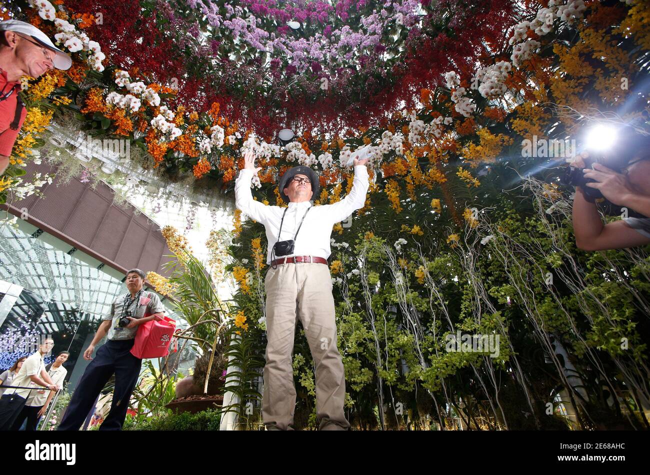 Landscape Architect Jun Ichi Inada Of Japan Speaks About His Floral Display Creation Orchid Kaleidoscope Exhibited In The Singapore Garden Festival In Singapore August 15 14 The Ten Meter Tall Orchid Kaleidoscope Is Made Landscape Architect Jun Ichi Inada Of Japan Speaks About His Floral Display Creation Orchid Kaleidoscope Exhibited In The Singapore Garden Festival In Singapore August 15 14 The Ten Meter Tall Orchid Kaleidoscope Is Made