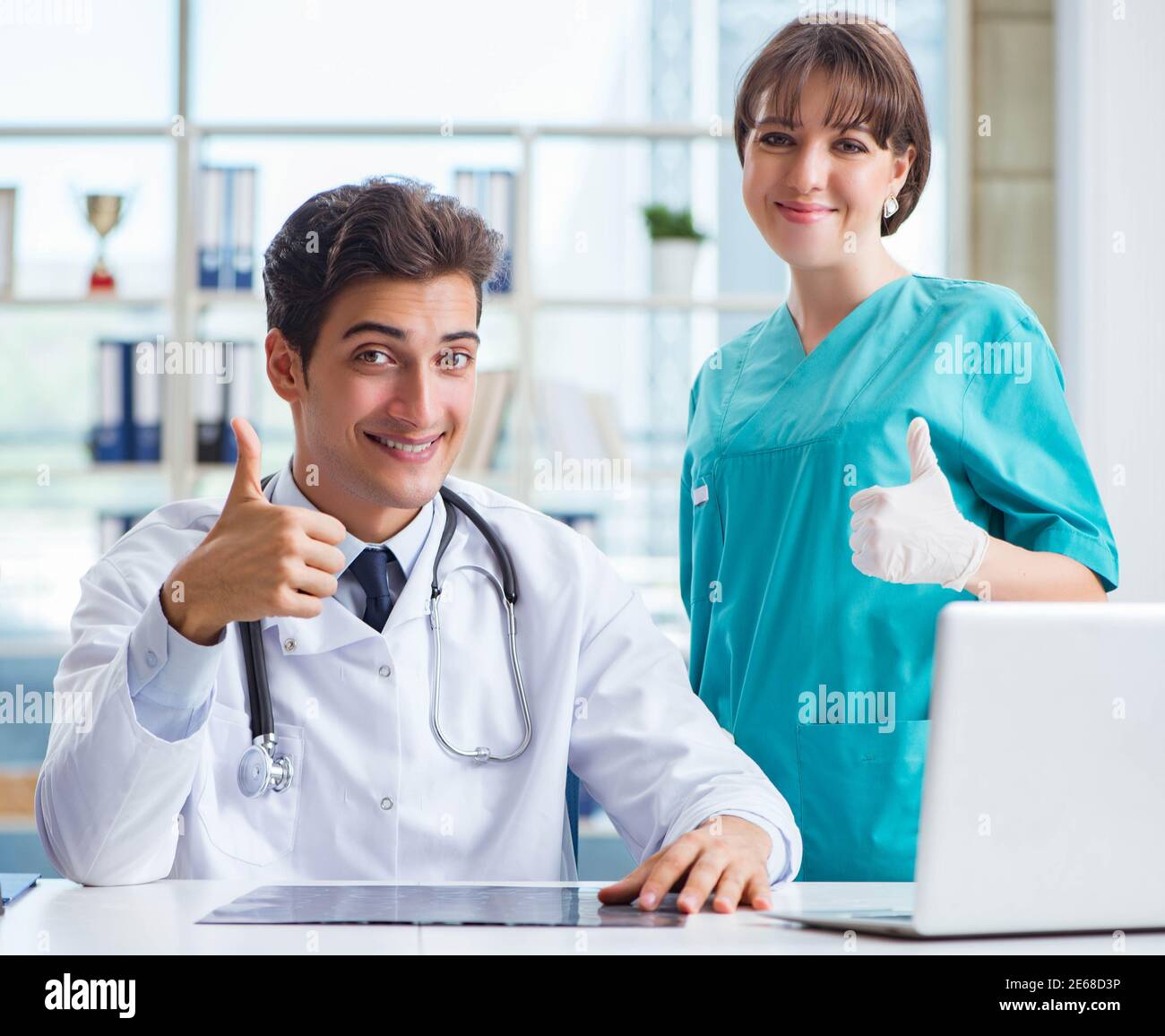 Doctors having medical discussion radiography hi-res stock photography ...