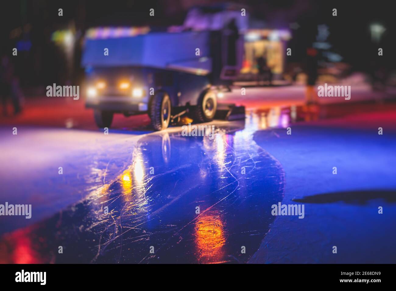 An ice resurfacing machine, ice resurfacer on a ice rink, resurfacing